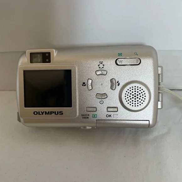 Olympus 4.0 Megapixel Silver and Gold Camera - Picture 2 of 9
